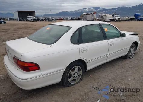 1998 Toyota Avalon z USA, uszkodzony, nr VIN 4TBF1882WU287101